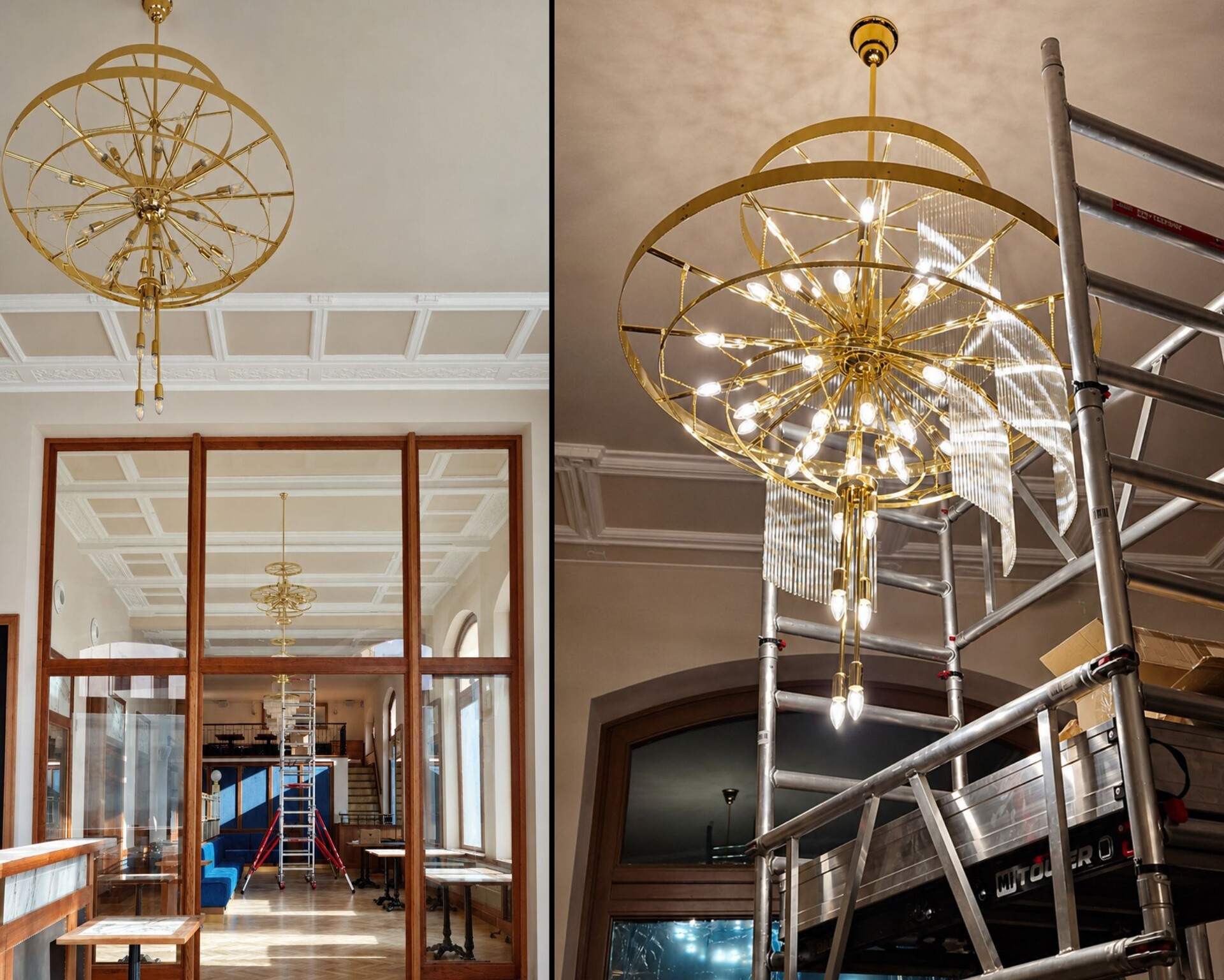 Installing a chandelier at Café Otava — brass frame hung below the coffered ceiling, partly fitted with glass tubes, scaffolding alongside