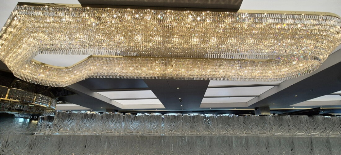 Crystal chandelier above the bar – Fly Vista restaurant Prague
