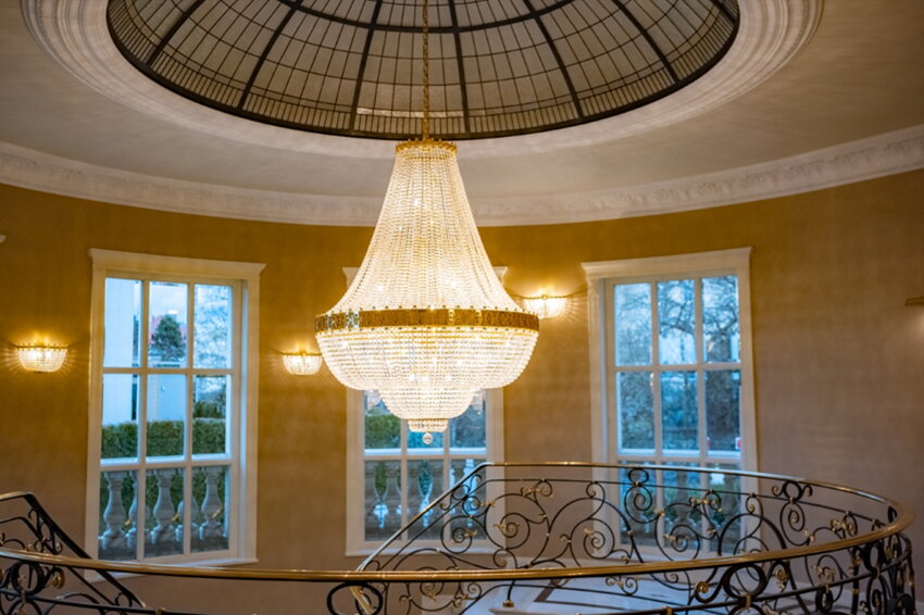Column and hallway lighting in a luxury Prague villa with crystal fixtures
