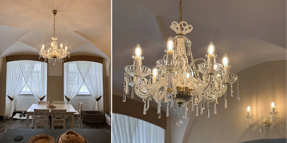 Castle kitchen with a designer crystal chandelier and wall light