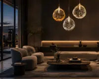 Three glass spheres hanging above the seating area in a modern living room with a city view