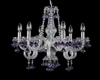 Crystal chandelier with six arms in silver finish on black background
