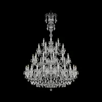 Large multi-tier crystal chandelier with many arms on black background