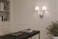 Wall sconce as accent lighting in a kitchen with open shelving