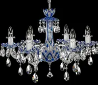 Crystal chandelier with six arms and blue pendants on black background
