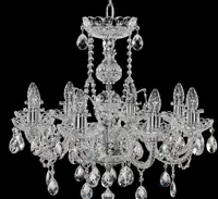 Crystal chandelier with eight arms in silver finish on black background